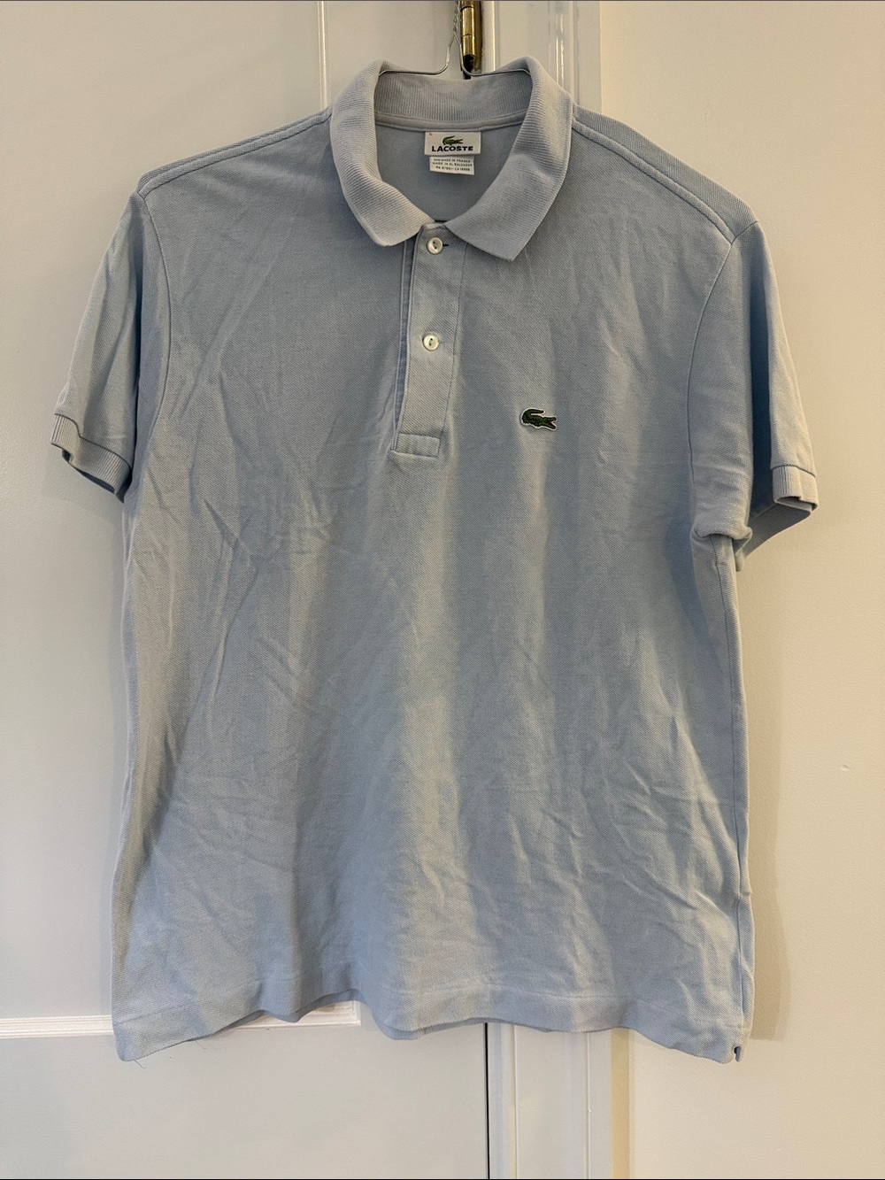 Lacoste Men’s Pale Blue Piqué Polo Shirt with Green Croc Logo